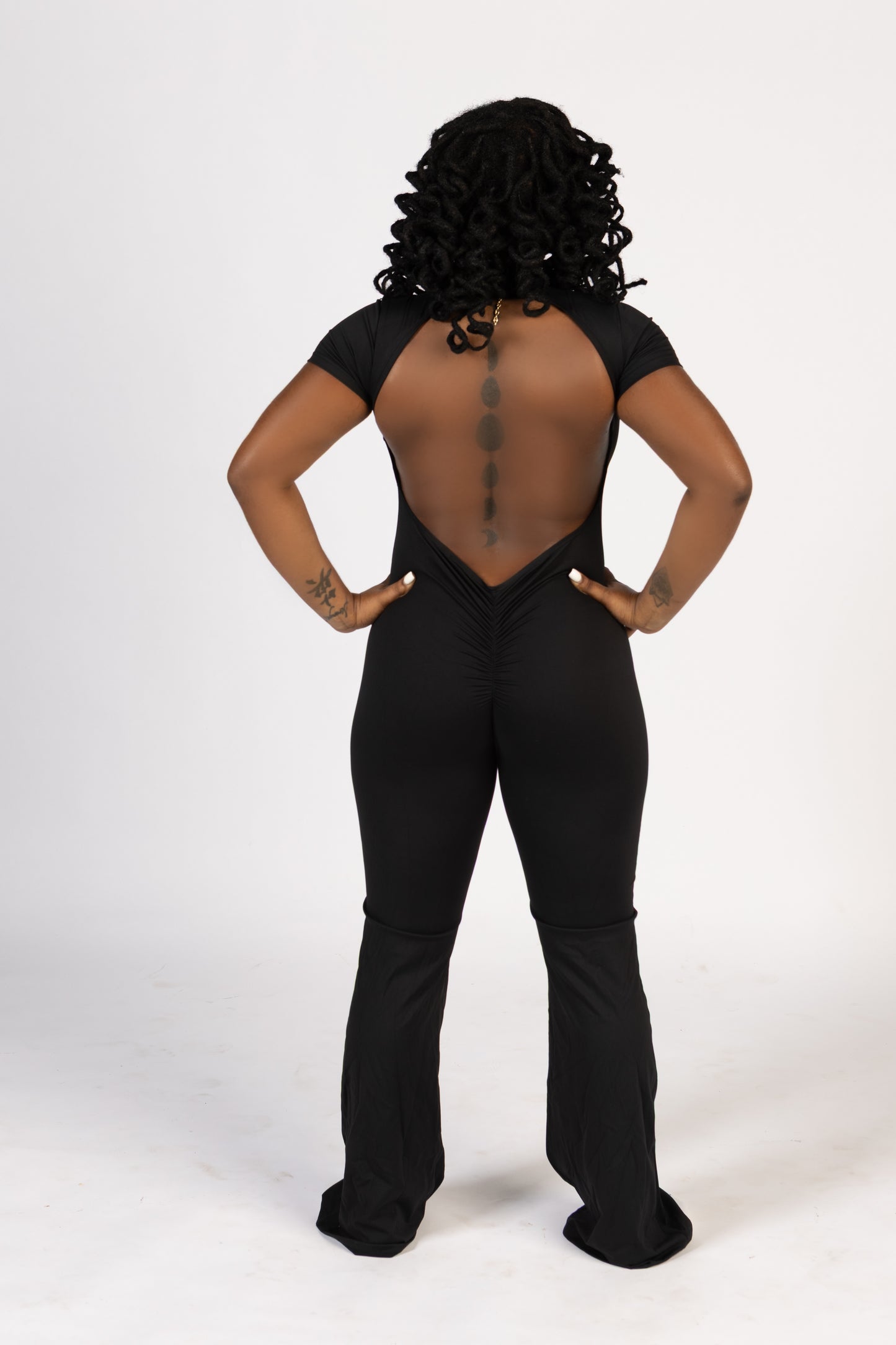 FLARE PANTS BACK OUT JUMPSUIT